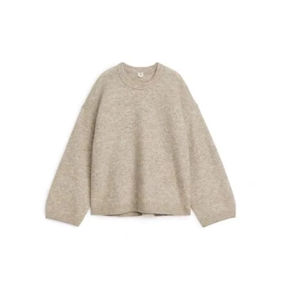 Damdesignerrandig stickad tröja med turtleneck